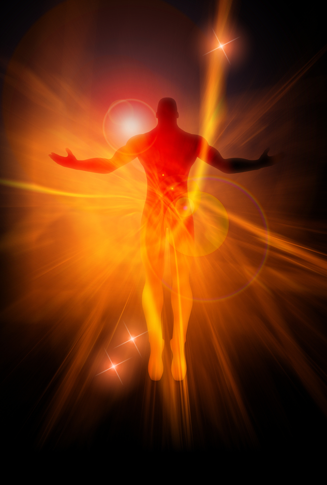 Spiritual Empowerment - pranic ernergy activation - image shows a warm light coming from a human figure